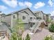 View of the backyard showing the deck, stairs, and fence at 762 Tailings Dr, Monument, CO 80132