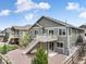 Backyard view highlighting the deck, stairs, and fully fenced backyard at 762 Tailings Dr, Monument, CO 80132