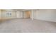 Partially finished basement provides an open space with carpeted floors and access to other rooms at 762 Tailings Dr, Monument, CO 80132