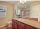 Bathroom featuring a vanity with granite countertop, toilet, and shower at 762 Tailings Dr, Monument, CO 80132