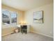Bedroom featuring a built in desk and shuttered window for natural light at 762 Tailings Dr, Monument, CO 80132