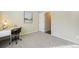 Bedroom with carpet, a desk and chair, and a large window for natural light at 762 Tailings Dr, Monument, CO 80132
