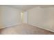 Bedroom showcasing neutral walls and carpeted floors with closet access for storage at 762 Tailings Dr, Monument, CO 80132
