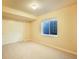 Bedroom with double closet, neutral walls, and carpet, providing comfort and space at 762 Tailings Dr, Monument, CO 80132