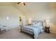 Vaulted ceiling bedroom features neutral tones, carpet, and plenty of natural light at 762 Tailings Dr, Monument, CO 80132