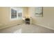 Cozy bedroom with neutral walls, carpet, and desk by the window, ideal for a home office at 762 Tailings Dr, Monument, CO 80132