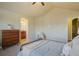 Spacious bedroom with a vaulted ceiling and an ensuite bathroom at 762 Tailings Dr, Monument, CO 80132