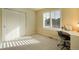 Bright bedroom with a large window, carpeted floor and an abundance of natural light at 762 Tailings Dr, Monument, CO 80132