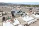 Charming home with a two-car garage, set against a backdrop of mountains and neighborhood homes at 762 Tailings Dr, Monument, CO 80132