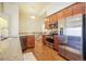 Modern kitchen with stainless steel appliances and granite countertops at 762 Tailings Dr, Monument, CO 80132