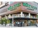 Upscale Whole Foods Market with outdoor seating and a modern facade, ideal for urban living at 1801 Wynkoop St # 411, Denver, CO 80202