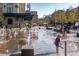 Inviting splash pad with fountains and urban architecture, a lively community gathering place at 1801 Wynkoop St # 411, Denver, CO 80202
