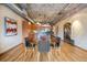 Open concept living area features a dining table and modern kitchen design at 1801 Wynkoop St # 411, Denver, CO 80202