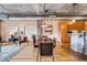 Inviting living area featuring a dining table and adjacent modern kitchen at 1801 Wynkoop St # 411, Denver, CO 80202