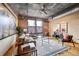 Bright living room with exposed brick, large windows, and stylish decor at 1801 Wynkoop St # 411, Denver, CO 80202