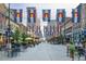 Charming street adorned with Colorado flags, lined with shops and eateries, perfect for strolling at 1801 Wynkoop St # 411, Denver, CO 80202