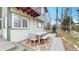 A stylish patio area features outdoor dining and complements the home's exterior design at 360 Peregrine Cir, Broomfield, CO 80020