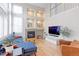 Bright living room with vaulted ceilings, fireplace, and hardwood floors at 360 Peregrine Cir, Broomfield, CO 80020