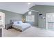 This main bedroom boasts vaulted ceilings, lots of natural light, and doors leading to a private balcony at 360 Peregrine Cir, Broomfield, CO 80020