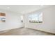 Bright bedroom with large windows providing great light and a mountain view at 8213 Butte Creek St, Littleton, CO 80125