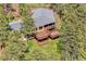 Aerial view of home featuring a tiered deck perfect for enjoying serene mountain views and outdoor living at 900 Ballantine Rd, Golden, CO 80401