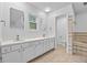 Bright bathroom with double vanity sinks and ample storage space at 900 Ballantine Rd, Golden, CO 80401