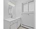 Bright bathroom with vanity, sink, and large mirror at 900 Ballantine Rd, Golden, CO 80401