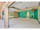Large, well-lit garage with shelving and a heater at 900 Ballantine Rd, Golden, CO 80401