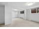 Finished basement with neutral carpet, recessed lighting, and storage closet at 3666 S Jersey St, Denver, CO 80237
