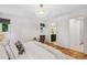 Bright main bedroom boasts an en-suite bathroom and generous closet space at 3666 S Jersey St, Denver, CO 80237
