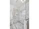 Luxurious walk-in shower features marble tiling, glass door, and rainfall shower head at 3666 S Jersey St, Denver, CO 80237