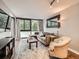 Comfortable living room with large windows, stylish furnishings, and ample natural light at 1050 N Corona St # 105, Denver, CO 80218