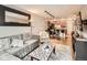 Open living space with seamless flow between living and dining areas, perfect for modern living at 1050 N Corona St # 105, Denver, CO 80218