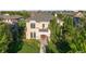 Stately two-story home with a charming front porch, manicured landscaping, and elegant architectural details at 2362 Spruce Way, Denver, CO 80238