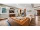 Bright living room with a cozy fireplace, a comfortable leather sofa, and stylish decor at 2362 Spruce Way, Denver, CO 80238