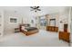 Spacious main bedroom boasts large windows, tray ceiling and ensuite access at 2362 Spruce Way, Denver, CO 80238
