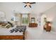 Sun-filled main bedroom with windows, ceiling fan, and stylish decor at 2362 Spruce Way, Denver, CO 80238