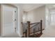 Staircase with decorative wrought iron and wood banister, leading to upper level at 2362 Spruce Way, Denver, CO 80238