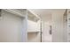 Walk-in closet featuring ample hanging space and shelving at 2362 Spruce Way, Denver, CO 80238