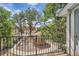 Balcony view of a gazebo surrounded by a garden at 63 S Sable Blvd # E22, Aurora, CO 80012