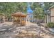 Community gazebo surrounded by lots of trees at 63 S Sable Blvd # E22, Aurora, CO 80012