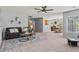Open-concept living room and dining area filled with natural light and stylish decor at 9721 Marmot Ridge Cir, Littleton, CO 80125