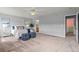 Light-filled bedroom offering plush carpeting and a comfortable, inviting atmosphere at 9721 Marmot Ridge Cir, Littleton, CO 80125