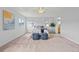 Spacious bedroom showcasing plush carpet, neutral walls, and stylish accents at 9721 Marmot Ridge Cir, Littleton, CO 80125