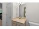 Bathroom featuring a vanity with a cream countertop and neutral walls at 1901 S Union Pl, Lakewood, CO 80228