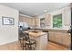 Kitchen featuring stainless steel appliances, granite countertops, an island, and wood floors at 1901 S Union Pl, Lakewood, CO 80228