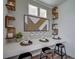 Stylish dining area featuring floating shelves and modern decor for a contemporary feel at 13151 E 103Rd Pl, Commerce City, CO 80022