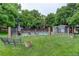 Community pool with lush green surrounding and seating available for residents at 2430 W 82Nd Pl # 2F, Westminster, CO 80031