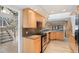 A view of the kitchen featuring granite countertops and stainless steel appliances at 2770 S Elmira St # 2, Denver, CO 80231