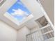 Hallway featuring a skylight bringing in natural light at 2770 S Elmira St # 2, Denver, CO 80231